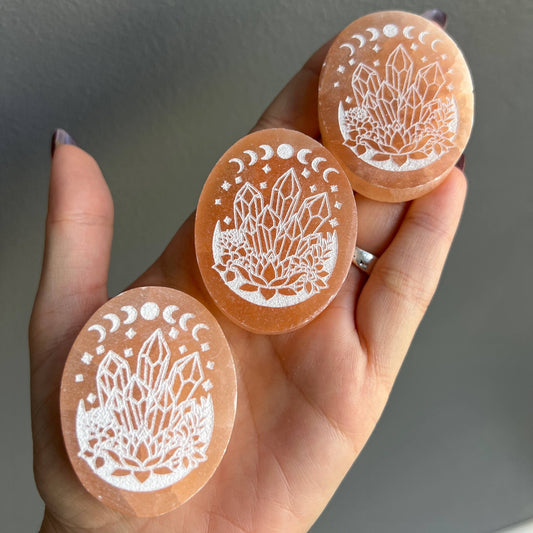 Peach Selenite Etched Oval Crystal Carving